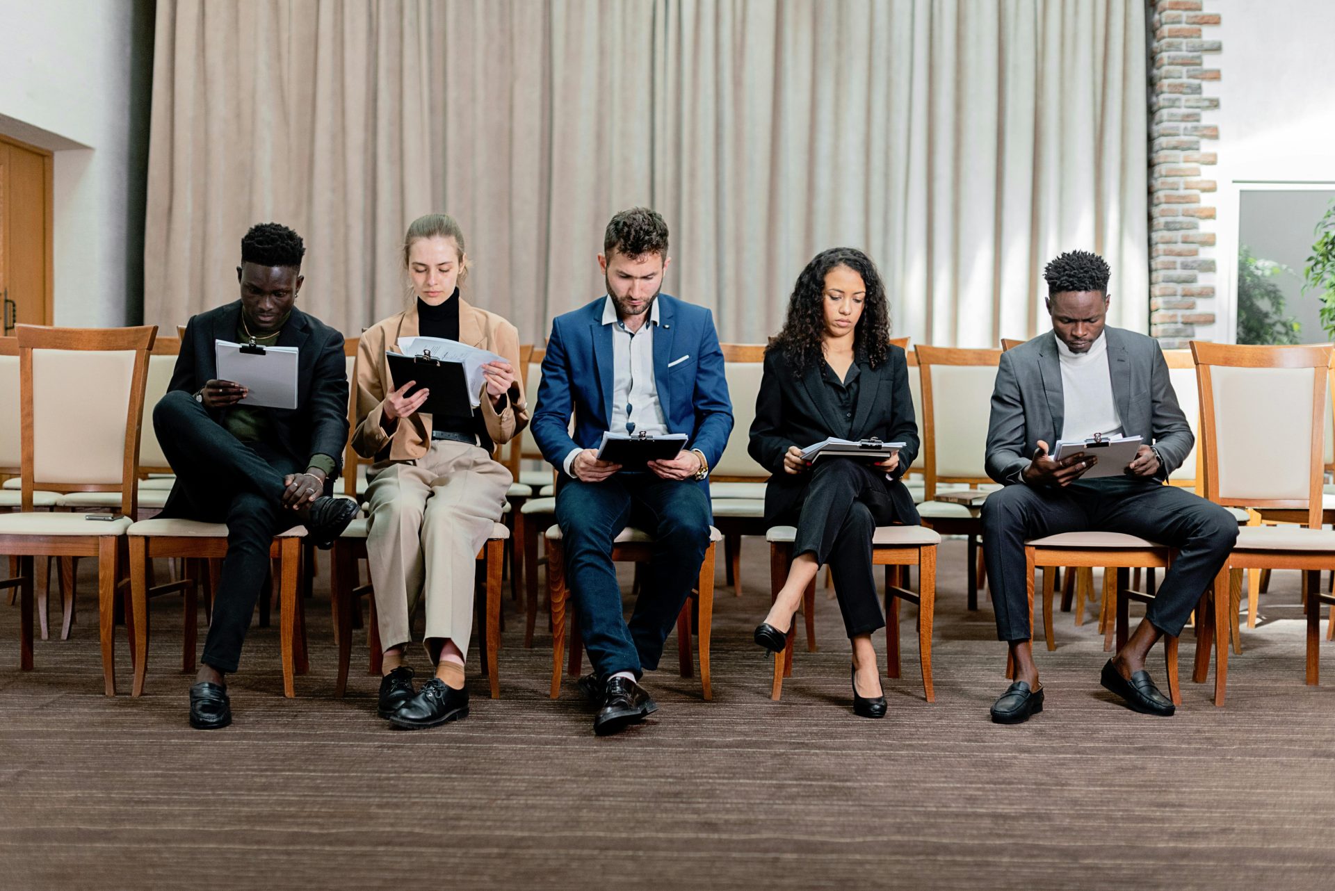 People waiting in chairs